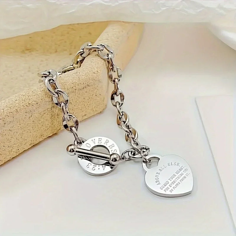 Bracelet en acier inoxydable avec pendentif double cœur