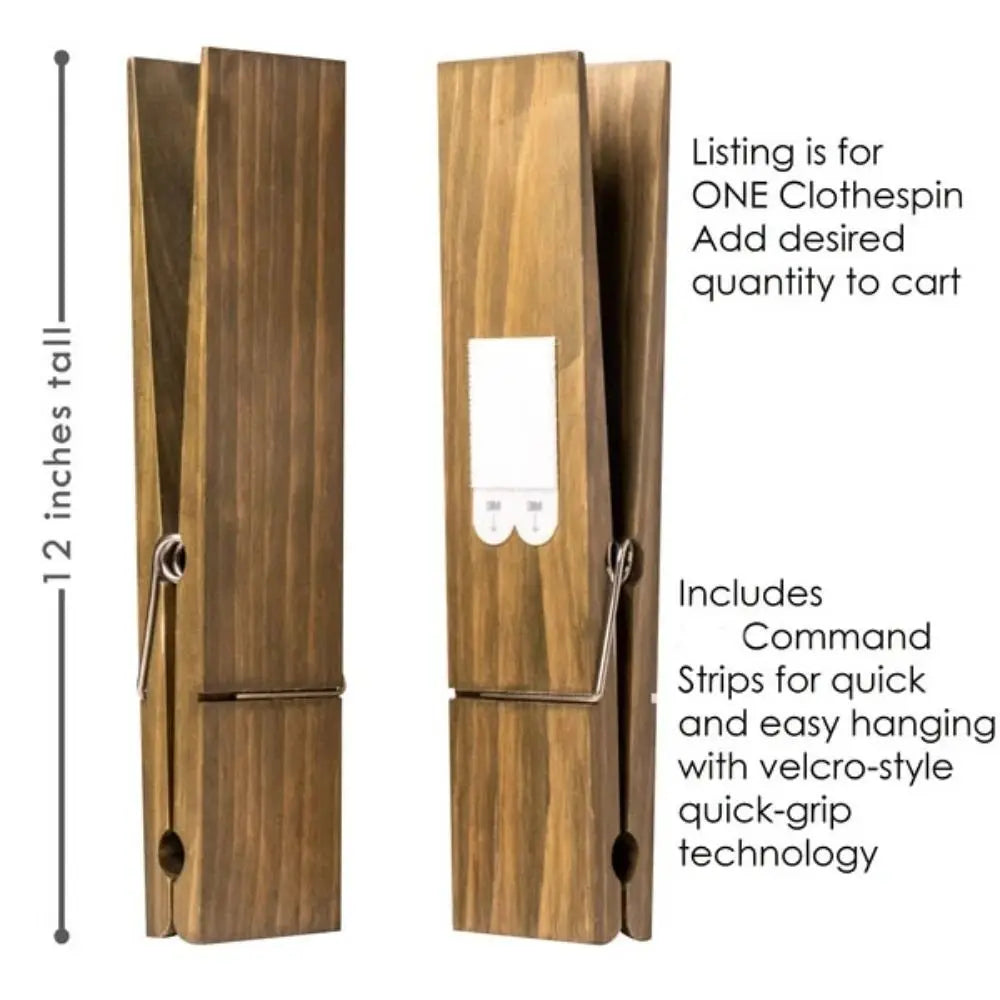 A pair of rustic wooden wall-mounted towel clips, designed for quick and easy hanging.
