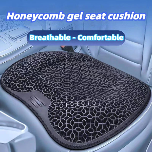 Honeycomb gel seat cushion in gray fabric placed on a car seat.