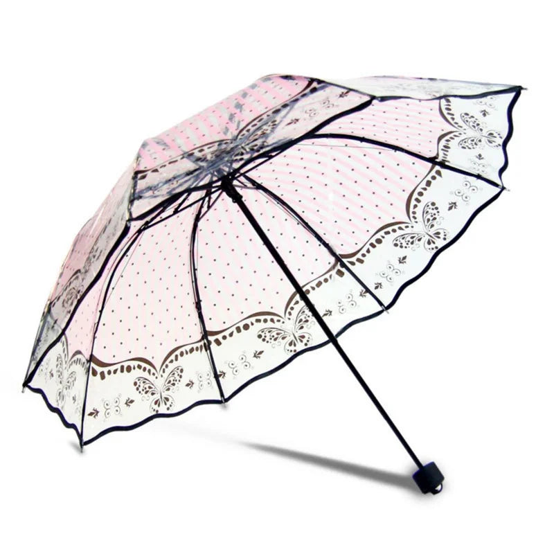 A retro transparent arch umbrella with a pink and white floral lace design.