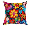 A decorative pillowcase featuring a vibrant floral print with various colors like yellow, orange, pink, and blue.