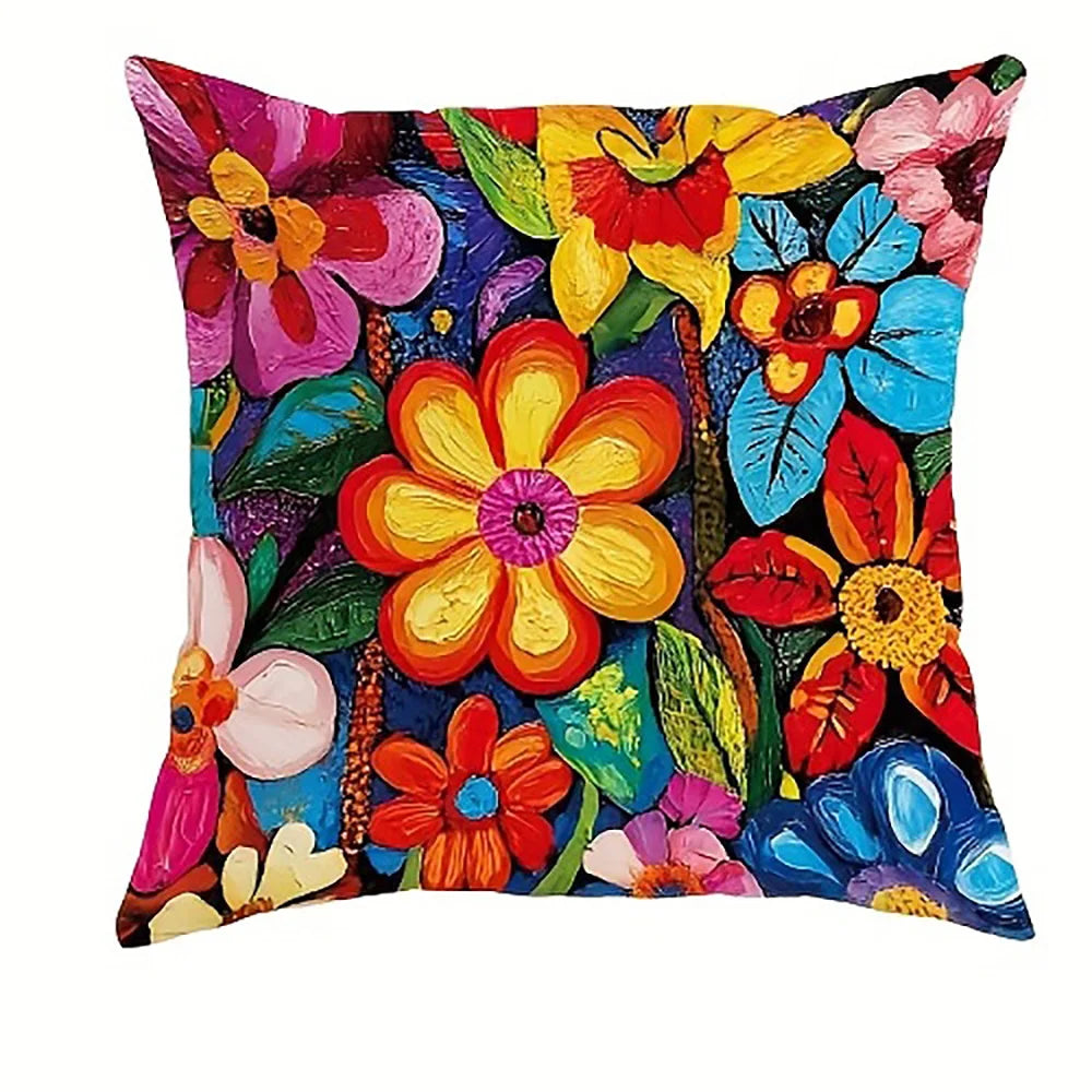 A decorative pillowcase featuring a vibrant floral print with various colors like yellow, orange, pink, and blue.
