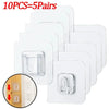 Ten pairs of transparent adhesive wall hooks in white and clear plastic are shown, with a close-up view of the hook design.
