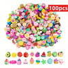 A large pile of 100 assorted polymer clay beads shaped like summer fruits for jewelry making