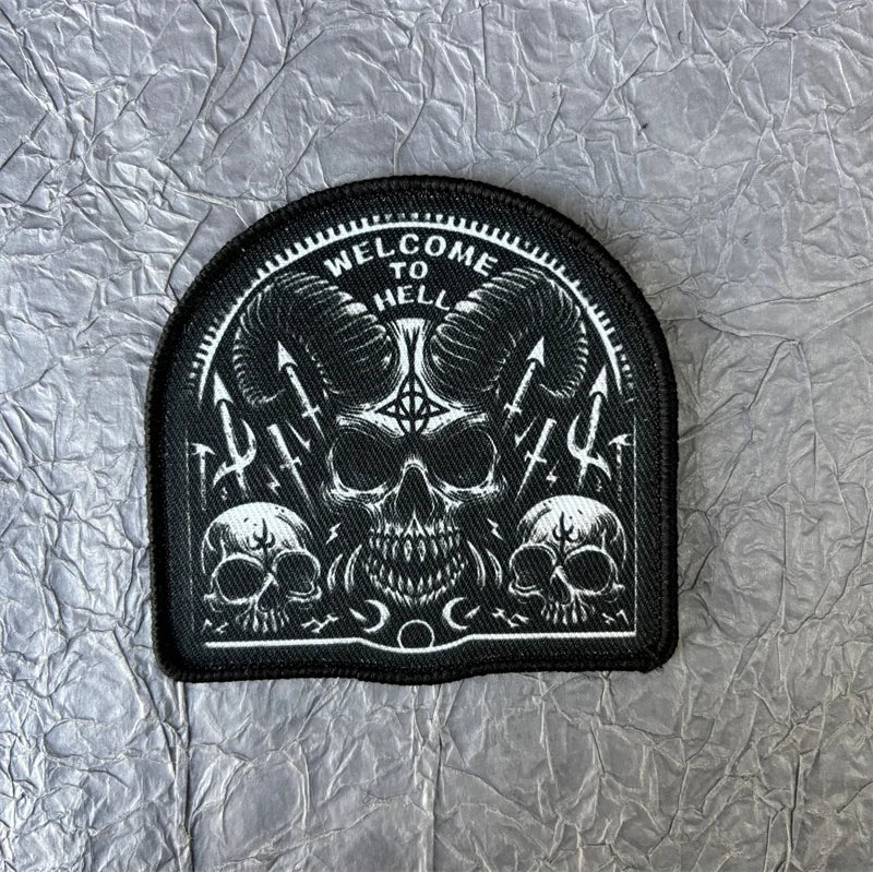 Black tactical patch featuring a skull design with the text Welcome to Hell.