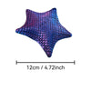 A purple and blue 3D printed articulated starfish fidget toy with a textured surface.