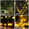 A collage showing solar-powered crystal ball string lights decorating a tree, wall, fence, and indoor decor.