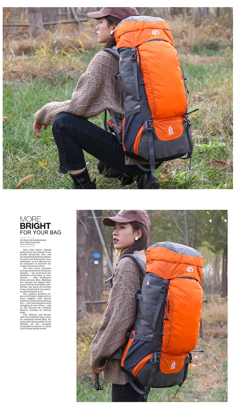 A woman wearing a tan jacket is shown sitting down with an orange and gray waterproof hiking backpack in a grassy outdoor set