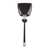 A black novelty toilet brush with a figure on the handle and a stand.