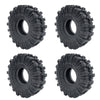 A set of black soft rubber tires for 1/18 and 1/24 RC crawler cars.