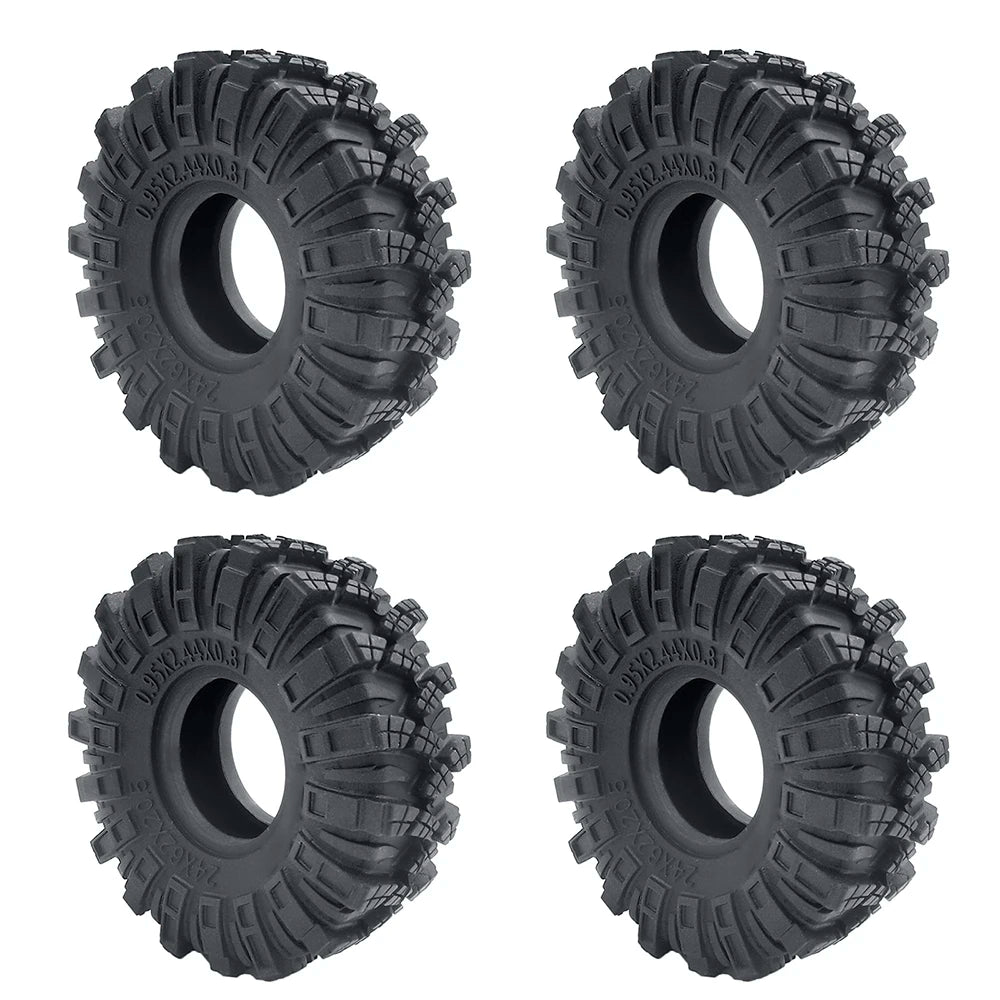 A set of black soft rubber tires for 1/18 and 1/24 RC crawler cars.