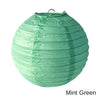 A mint green paper lantern with a gathered, round shape.