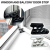 Close-up view of black and white window and balcony door stop wedges for sealing gaps.