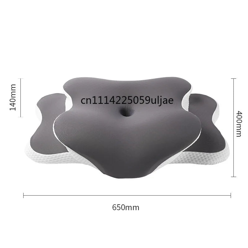 Gray ergonomic memory foam pillow with white accents shown from above and side views.