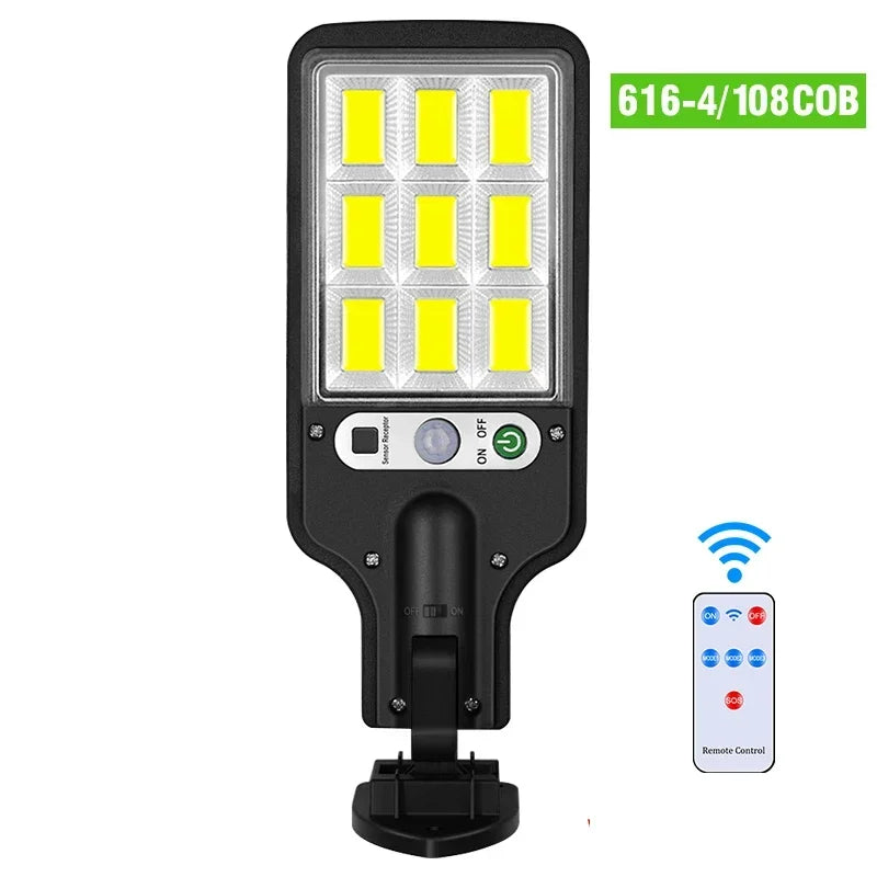 A black solar powered motion sensor wall light with ten yellow LEDs and a remote control.