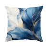 Abstract leaf print cushion cover featuring blue and white watercolor leaves with gold accents
