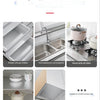 Various kitchen accessories including a drawer, sink, pot, and cabinet items demonstrating versatile usage.