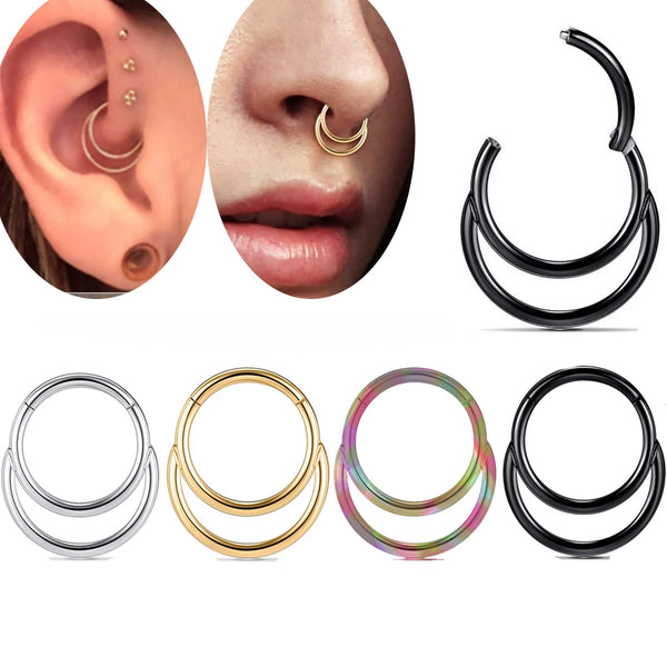 Un ensemble de anneaux à nez en acier inoxydable, diverses tailles et styles, montrés sur la peau et isolés.
