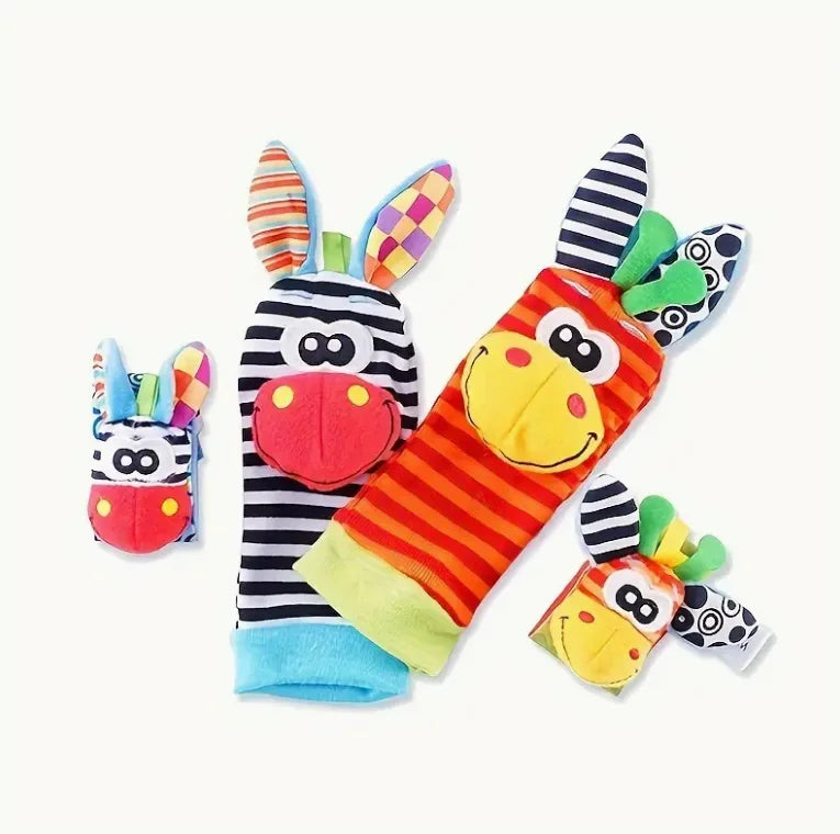 A set of soft baby wrist rattles and foot finder socks featuring colorful patterns and animal faces.