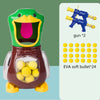 A plastic duck shooting target game featuring a green and yellow duck head and a brown body, with an air-powered gun and 24 s