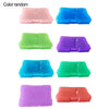 Five colorful clear photo storage boxes in pink, blue, green, purple, and orange.