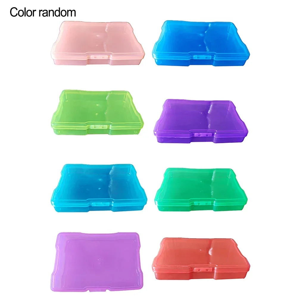 Five colorful clear photo storage boxes in pink, blue, green, purple, and orange.