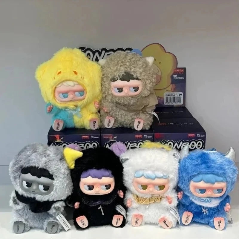 A collection of MONBOO Emotional Weather Station blind box figures in various colors and textures.