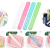 A set of colorful travel toothbrushes in a clear case and pink woven holders.