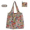 A floral patterned reusable shopping tote bag made of nylon fabric.