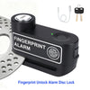A black fingerprint alarm disc lock device shown next to its components and a metal disc.