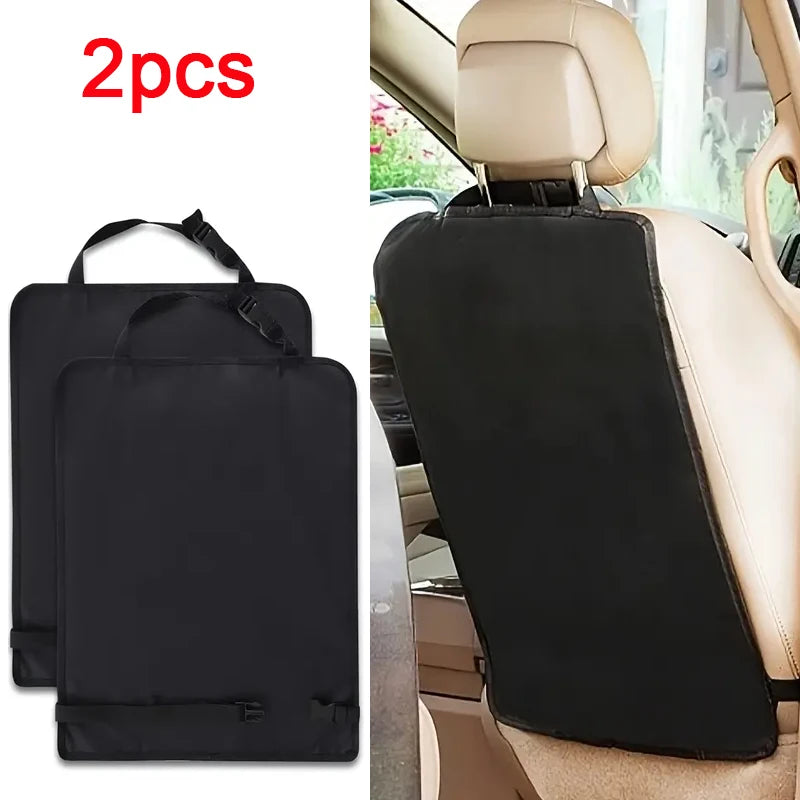 Two black waterproof car seat back kick protectors shown next to a beige car seat interior.