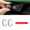 Two clear camera protective covers for a car camera, shown next to an open camera housing.