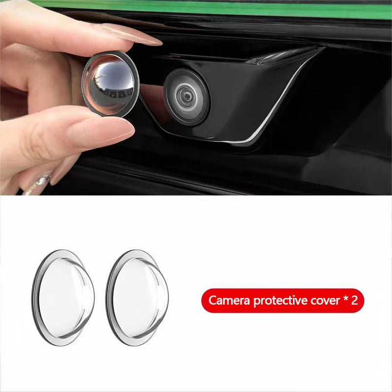 Two clear camera protective covers for a car camera, shown next to an open camera housing.