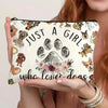 A canvas charger storage pouch featuring illustrations of various cats and a girl theme.