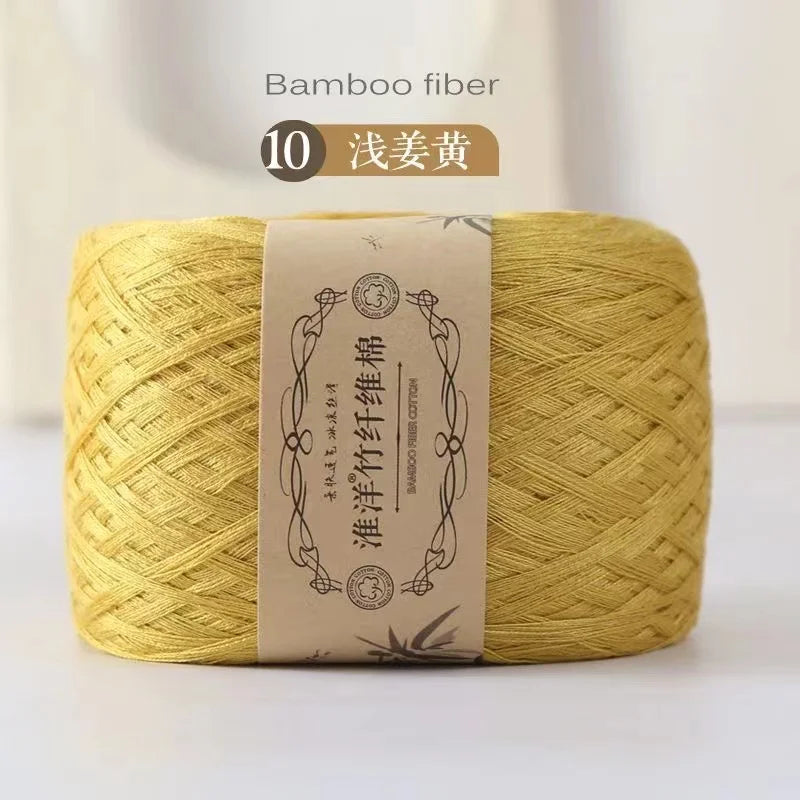 A ball of yellow bamboo fiber yarn labeled for 10 washes.