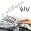 A hand is using a professional car window tint kit to apply a film to a car window.