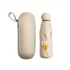 A beige compact folding umbrella with a rolled-up handle and a light beige protective sleeve.