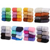 A collection of eight colored wool roving packs for needle felting, stacked in rows.