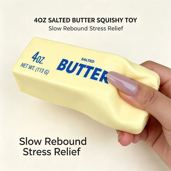 A hand holds a yellow salted butter squishy toy, demonstrating its slow rebound stress relief.