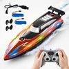 A person holds a red high-speed RC speedboat with LED lights and control accessories.