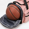 A pink tactical nylon backpack with a black mesh ball inside.
