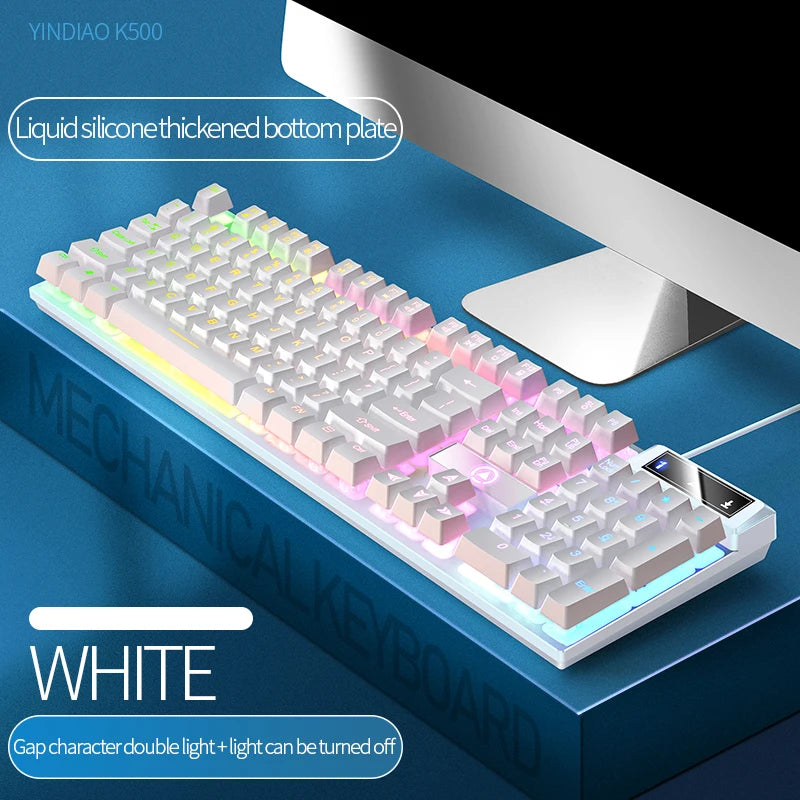 White mechanical keyboard with liquid silicone bottom plate and RGB lighting displayed on a blue surface.