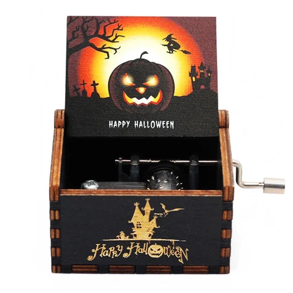 A wooden music box with a Halloween theme featuring a carved pumpkin and castle silhouette.