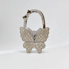 Silver foldable butterfly shaped handbag hook with sparkling details