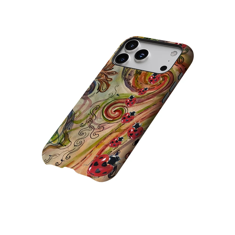 A phone case featuring a swirling ladybug design with multiple red insects and green foliage.