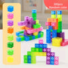 A collection of 300 random color magnetic building blocks stacked and arranged in various shapes.