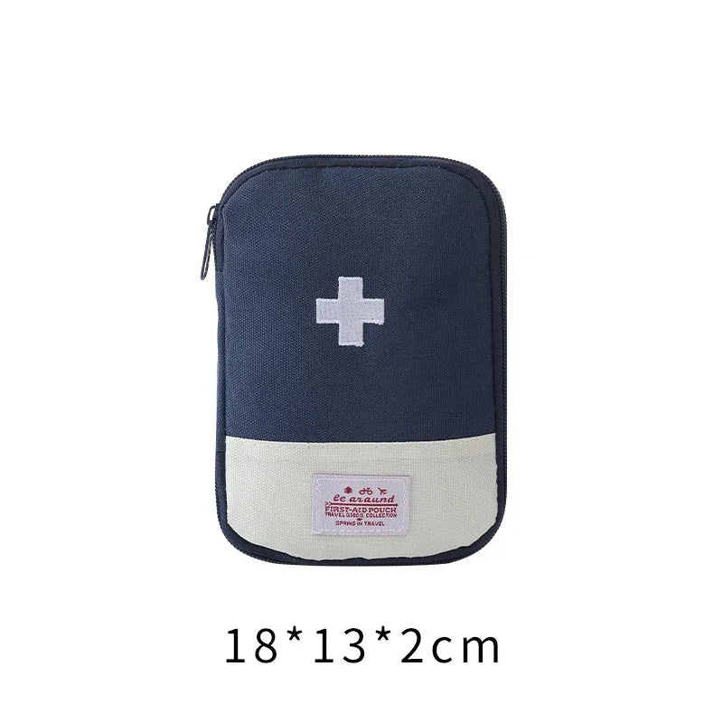 Navy blue portable mini first aid kit organizer bag with a white cross symbol and beige accent.