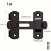 A black stainless steel flip barn door lock with mounting plates and keys.