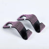 A pair of black car seat storage hooks decorated with pink crystal diamond accents.
