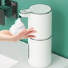 A white touchless automatic soap dispenser is shown with a hand applying soap, demonstrating ultra-fast foaming.